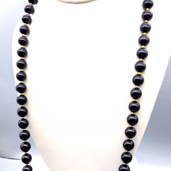 Chic Vintage Black Lucite Beads Necklace with Gold Tone Spacers and Hidden Hand - Picture 3 of 4